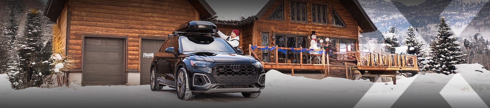 nexauto : Pre-owned black Audi SQ5 parked in the driveway of a log cabin.